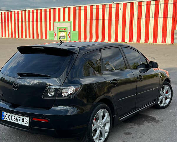 Чорний Мазда 3, об'ємом двигуна 2 л та пробігом 255 тис. км за 6500 $, фото 7 на Automoto.ua