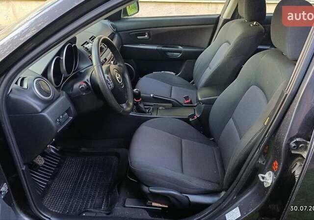 Чорний Мазда 3, об'ємом двигуна 1.6 л та пробігом 205 тис. км за 4999 $, фото 16 на Automoto.ua