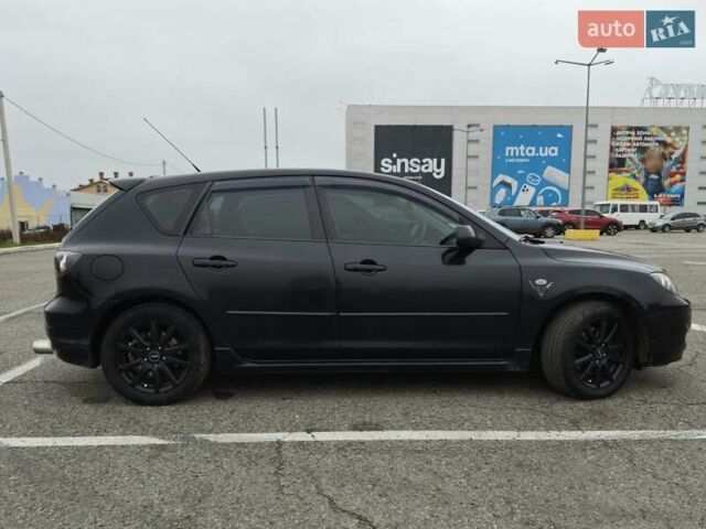 Чорний Мазда 3, об'ємом двигуна 2 л та пробігом 281 тис. км за 6500 $, фото 7 на Automoto.ua