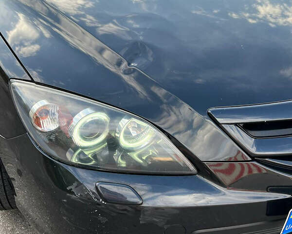 Чорний Мазда 3, об'ємом двигуна 2 л та пробігом 255 тис. км за 6500 $, фото 10 на Automoto.ua
