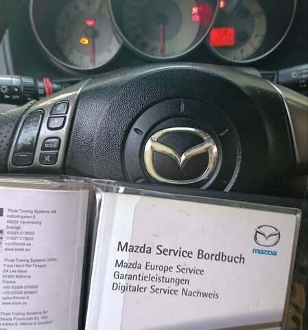 Чорний Мазда 3, об'ємом двигуна 1.6 л та пробігом 205 тис. км за 4999 $, фото 6 на Automoto.ua