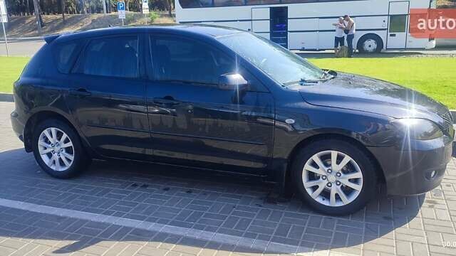Чорний Мазда 3, об'ємом двигуна 1.6 л та пробігом 215 тис. км за 6500 $, фото 17 на Automoto.ua