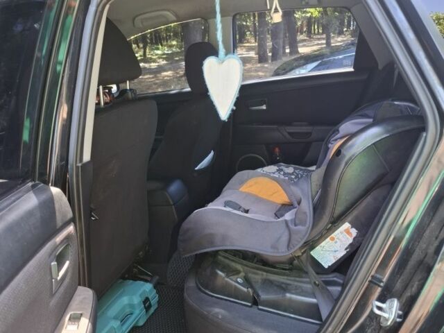 Черный Мазда 3, объемом двигателя 1.6 л и пробегом 200 тыс. км за 5700 $, фото 8 на Automoto.ua