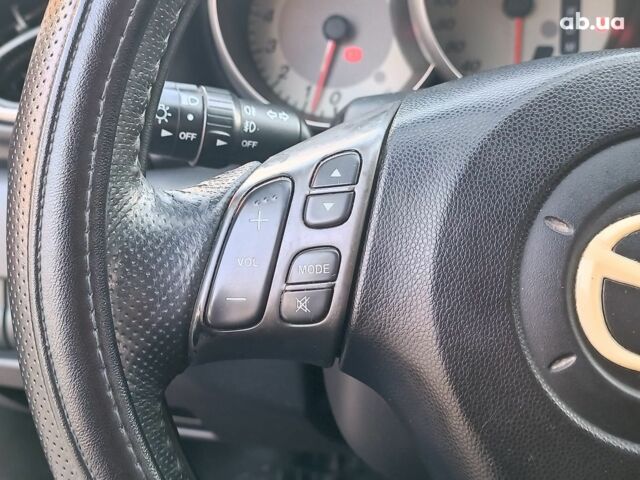 Чорний Мазда 3, об'ємом двигуна 1.6 л та пробігом 187 тис. км за 4990 $, фото 24 на Automoto.ua