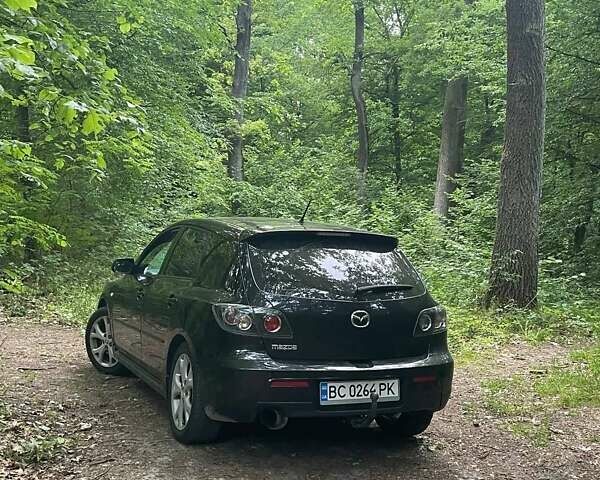 Чорний Мазда 3, об'ємом двигуна 2 л та пробігом 180 тис. км за 5888 $, фото 2 на Automoto.ua