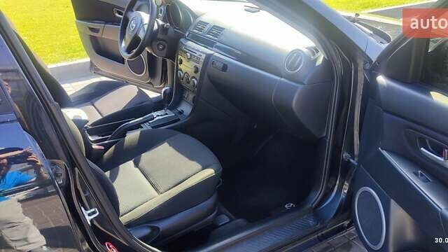 Чорний Мазда 3, об'ємом двигуна 1.6 л та пробігом 215 тис. км за 6500 $, фото 7 на Automoto.ua