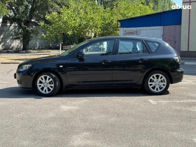 Черный Мазда 3, объемом двигателя 1.6 л и пробегом 131 тыс. км за 5990 $, фото 1 на Automoto.ua