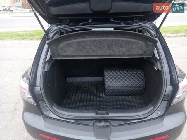 Черный Мазда 3, объемом двигателя 1.6 л и пробегом 165 тыс. км за 6100 $, фото 10 на Automoto.ua