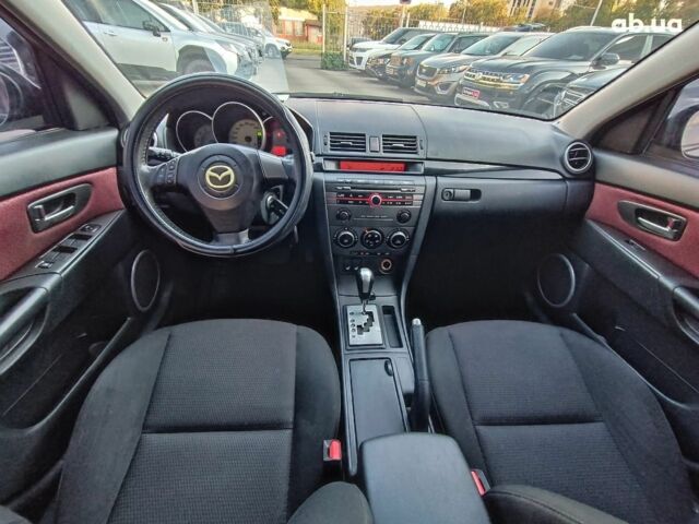 Чорний Мазда 3, об'ємом двигуна 1.6 л та пробігом 187 тис. км за 4990 $, фото 13 на Automoto.ua