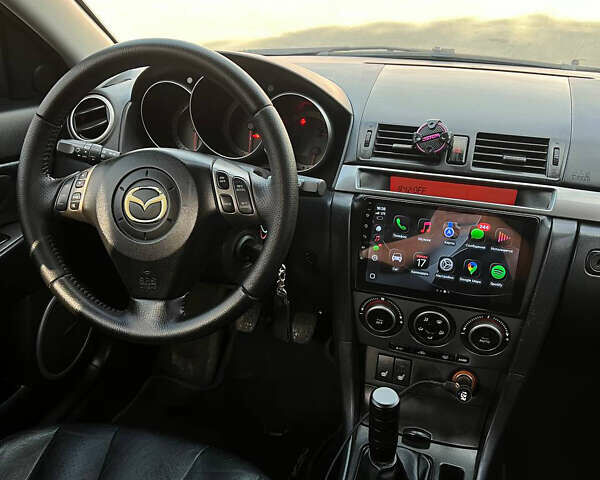 Чорний Мазда 3, об'ємом двигуна 2 л та пробігом 255 тис. км за 6500 $, фото 15 на Automoto.ua