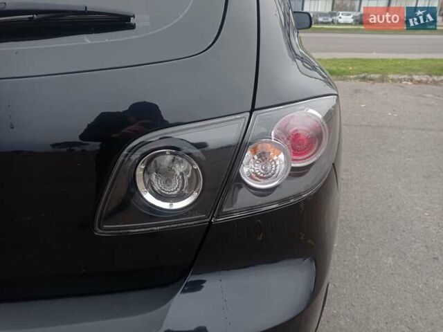 Черный Мазда 3, объемом двигателя 1.6 л и пробегом 165 тыс. км за 6100 $, фото 1 на Automoto.ua