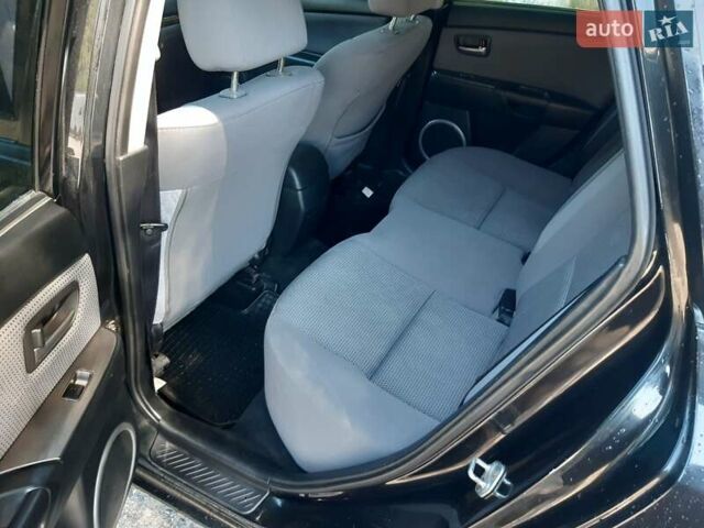 Чорний Мазда 3, об'ємом двигуна 1.6 л та пробігом 365 тис. км за 5900 $, фото 11 на Automoto.ua