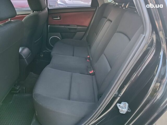 Чорний Мазда 3, об'ємом двигуна 1.6 л та пробігом 187 тис. км за 4990 $, фото 12 на Automoto.ua