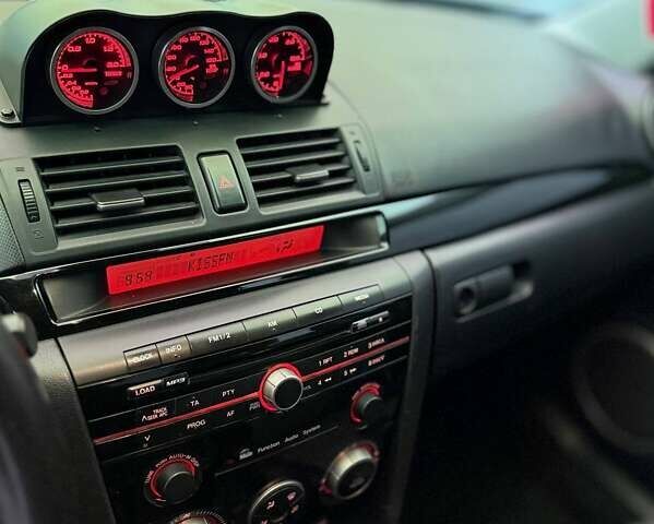 Чорний Мазда 3, об'ємом двигуна 2.26 л та пробігом 140 тис. км за 6700 $, фото 5 на Automoto.ua