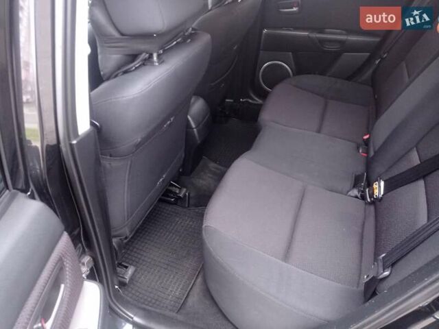 Черный Мазда 3, объемом двигателя 1.6 л и пробегом 165 тыс. км за 6100 $, фото 15 на Automoto.ua