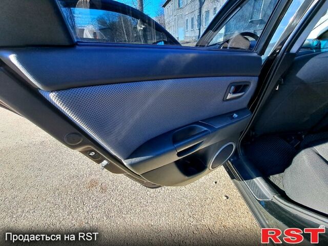 Черный Мазда 3, объемом двигателя 1.6 л и пробегом 176 тыс. км за 5300 $, фото 9 на Automoto.ua