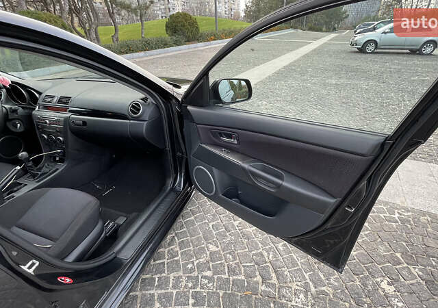 Черный Мазда 3, объемом двигателя 2 л и пробегом 220 тыс. км за 6000 $, фото 28 на Automoto.ua