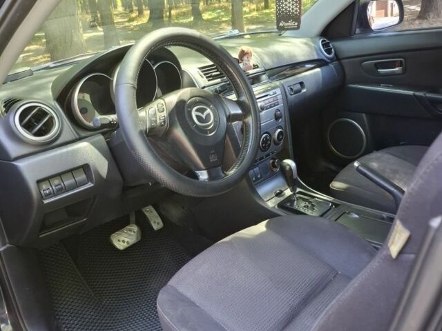 Черный Мазда 3, объемом двигателя 1.6 л и пробегом 200 тыс. км за 5700 $, фото 1 на Automoto.ua