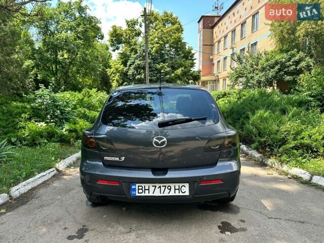 Чорний Мазда 3, об'ємом двигуна 1.6 л та пробігом 197 тис. км за 4500 $, фото 4 на Automoto.ua