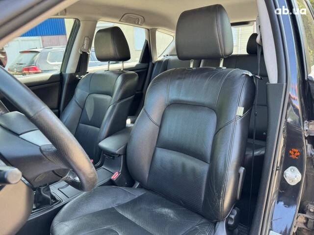 Черный Мазда 3, объемом двигателя 1.6 л и пробегом 131 тыс. км за 5990 $, фото 26 на Automoto.ua