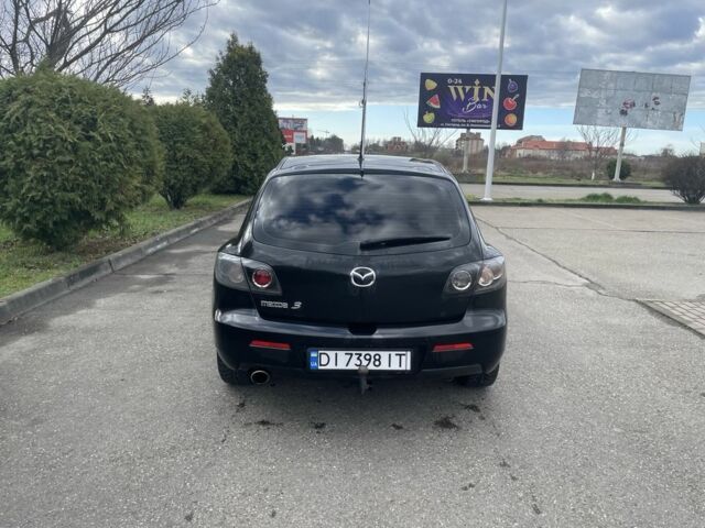Черный Мазда 3, объемом двигателя 2 л и пробегом 252 тыс. км за 3000 $, фото 1 на Automoto.ua