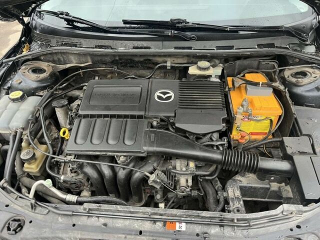 Черный Мазда 3, объемом двигателя 1.6 л и пробегом 212 тыс. км за 5500 $, фото 14 на Automoto.ua