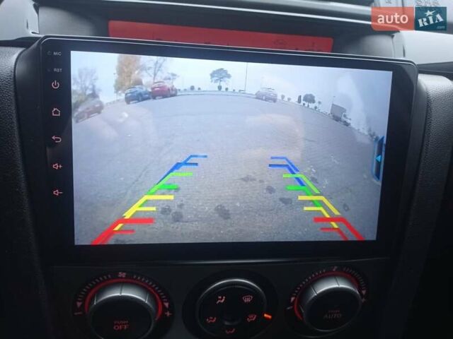 Черный Мазда 3, объемом двигателя 1.6 л и пробегом 165 тыс. км за 6100 $, фото 26 на Automoto.ua