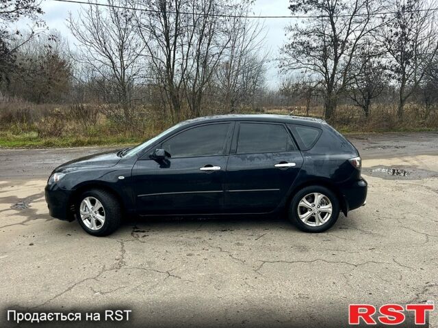 Черный Мазда 3, объемом двигателя 1.6 л и пробегом 212 тыс. км за 5500 $, фото 1 на Automoto.ua