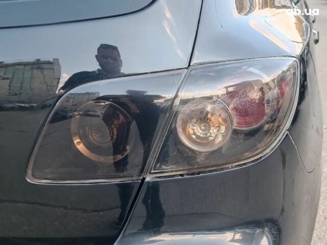 Чорний Мазда 3, об'ємом двигуна 1.6 л та пробігом 187 тис. км за 4990 $, фото 10 на Automoto.ua