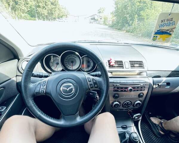 Черный Мазда 3, объемом двигателя 1.6 л и пробегом 228 тыс. км за 4999 $, фото 6 на Automoto.ua