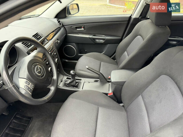 Черный Мазда 3, объемом двигателя 1.6 л и пробегом 217 тыс. км за 5800 $, фото 9 на Automoto.ua