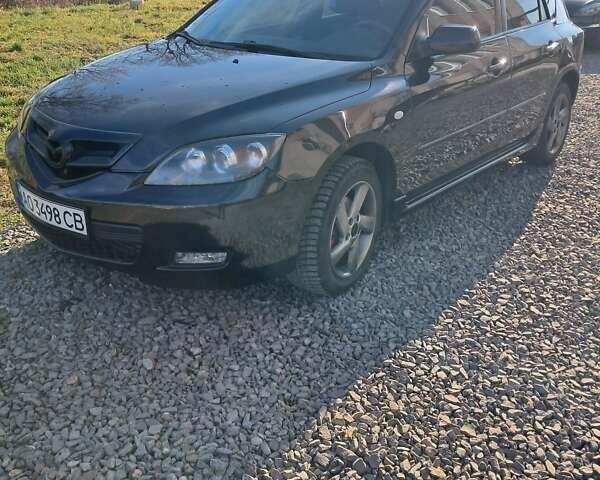 Черный Мазда 3, объемом двигателя 1.56 л и пробегом 233 тыс. км за 5200 $, фото 13 на Automoto.ua