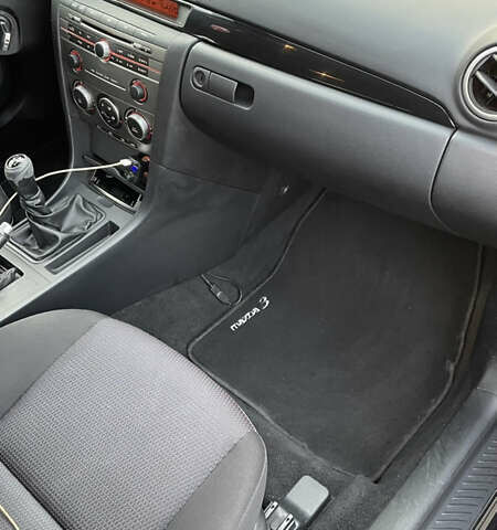 Черный Мазда 3, объемом двигателя 2 л и пробегом 220 тыс. км за 6000 $, фото 13 на Automoto.ua