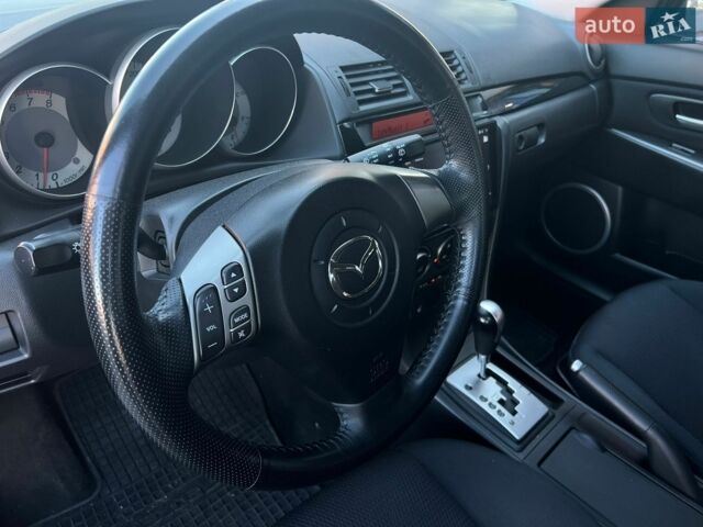 Чорний Мазда 3, об'ємом двигуна 1.6 л та пробігом 146 тис. км за 5850 $, фото 28 на Automoto.ua