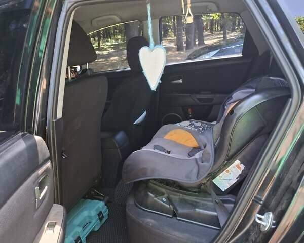 Черный Мазда 3, объемом двигателя 1.6 л и пробегом 199 тыс. км за 5900 $, фото 4 на Automoto.ua