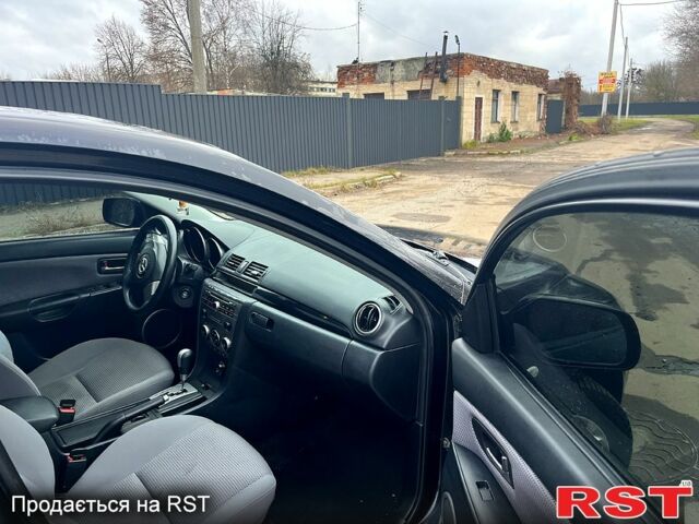 Черный Мазда 3, объемом двигателя 1.6 л и пробегом 212 тыс. км за 5500 $, фото 4 на Automoto.ua