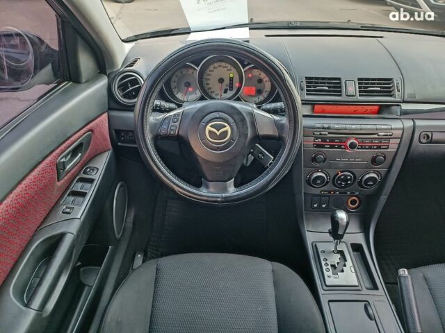 Чорний Мазда 3, об'ємом двигуна 1.6 л та пробігом 187 тис. км за 4990 $, фото 14 на Automoto.ua