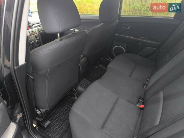 Чорний Мазда 3, об'ємом двигуна 1.6 л та пробігом 370 тис. км за 4500 $, фото 4 на Automoto.ua