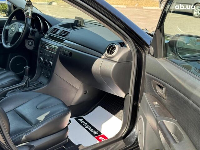 Черный Мазда 3, объемом двигателя 1.6 л и пробегом 131 тыс. км за 5990 $, фото 14 на Automoto.ua