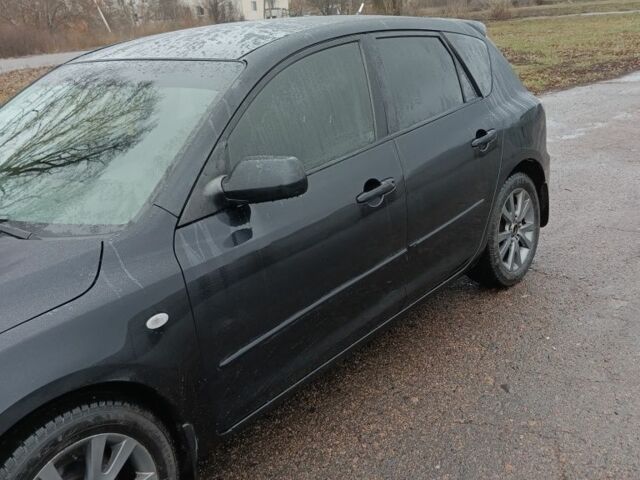 Черный Мазда 3, объемом двигателя 1.6 л и пробегом 256 тыс. км за 4600 $, фото 6 на Automoto.ua