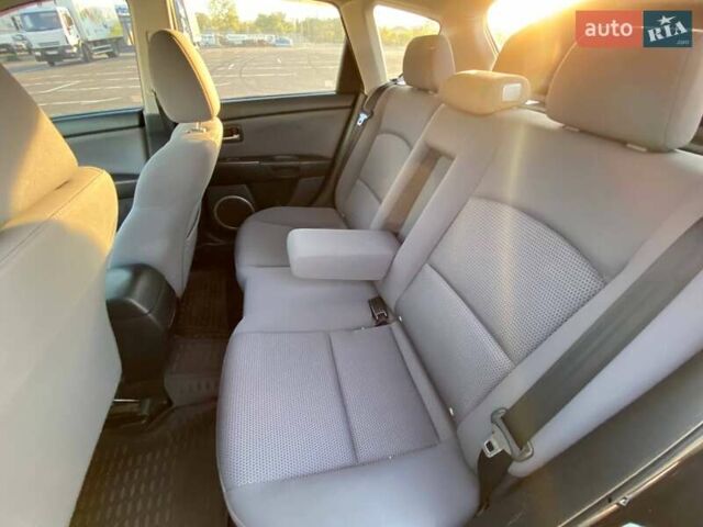 Черный Мазда 3, объемом двигателя 1.6 л и пробегом 168 тыс. км за 6300 $, фото 10 на Automoto.ua