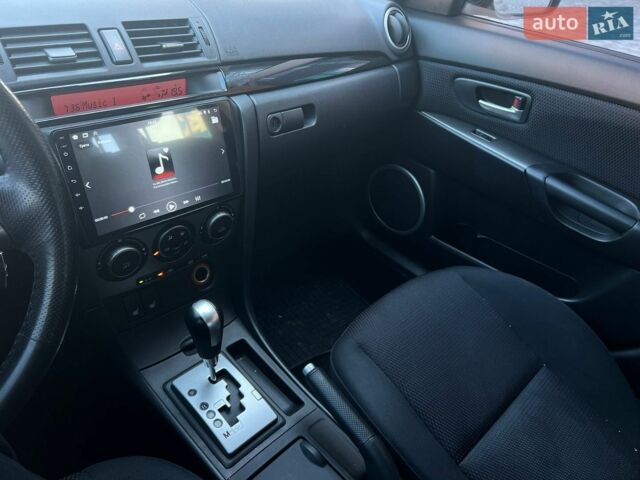 Чорний Мазда 3, об'ємом двигуна 1.6 л та пробігом 146 тис. км за 5850 $, фото 23 на Automoto.ua