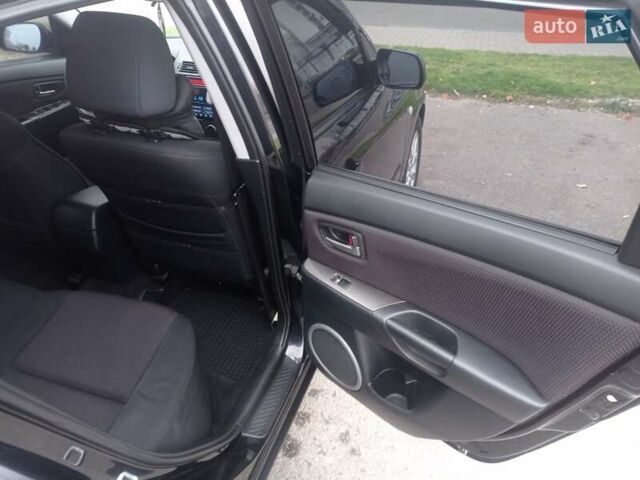 Черный Мазда 3, объемом двигателя 1.6 л и пробегом 165 тыс. км за 6100 $, фото 13 на Automoto.ua