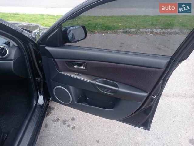 Черный Мазда 3, объемом двигателя 1.6 л и пробегом 165 тыс. км за 6100 $, фото 12 на Automoto.ua