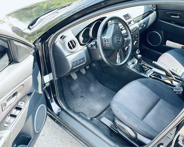 Черный Мазда 3, объемом двигателя 1.6 л и пробегом 228 тыс. км за 4999 $, фото 8 на Automoto.ua
