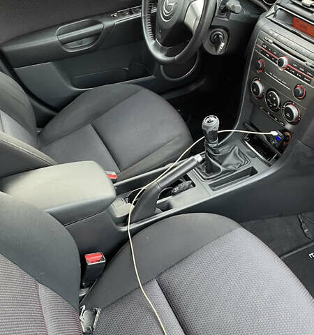 Черный Мазда 3, объемом двигателя 2 л и пробегом 220 тыс. км за 6000 $, фото 12 на Automoto.ua