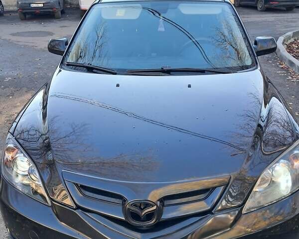 Черный Мазда 3, объемом двигателя 1.56 л и пробегом 233 тыс. км за 5200 $, фото 4 на Automoto.ua