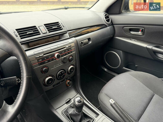 Черный Мазда 3, объемом двигателя 1.6 л и пробегом 217 тыс. км за 5800 $, фото 10 на Automoto.ua