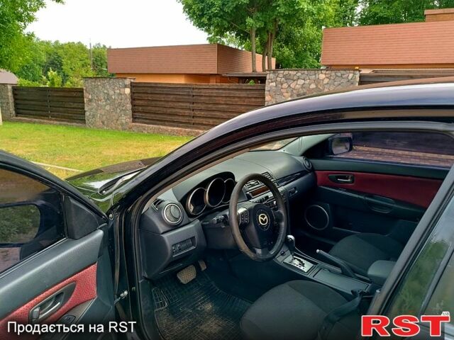 Черный Мазда 3, объемом двигателя 1.6 л и пробегом 155 тыс. км за 5200 $, фото 5 на Automoto.ua