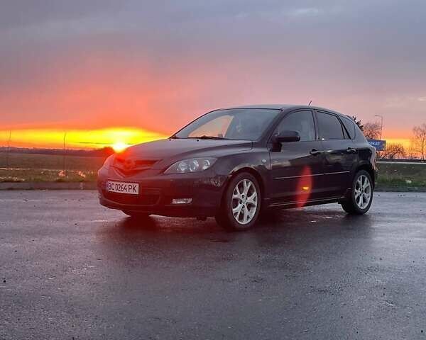 Чорний Мазда 3, об'ємом двигуна 2 л та пробігом 180 тис. км за 5888 $, фото 6 на Automoto.ua